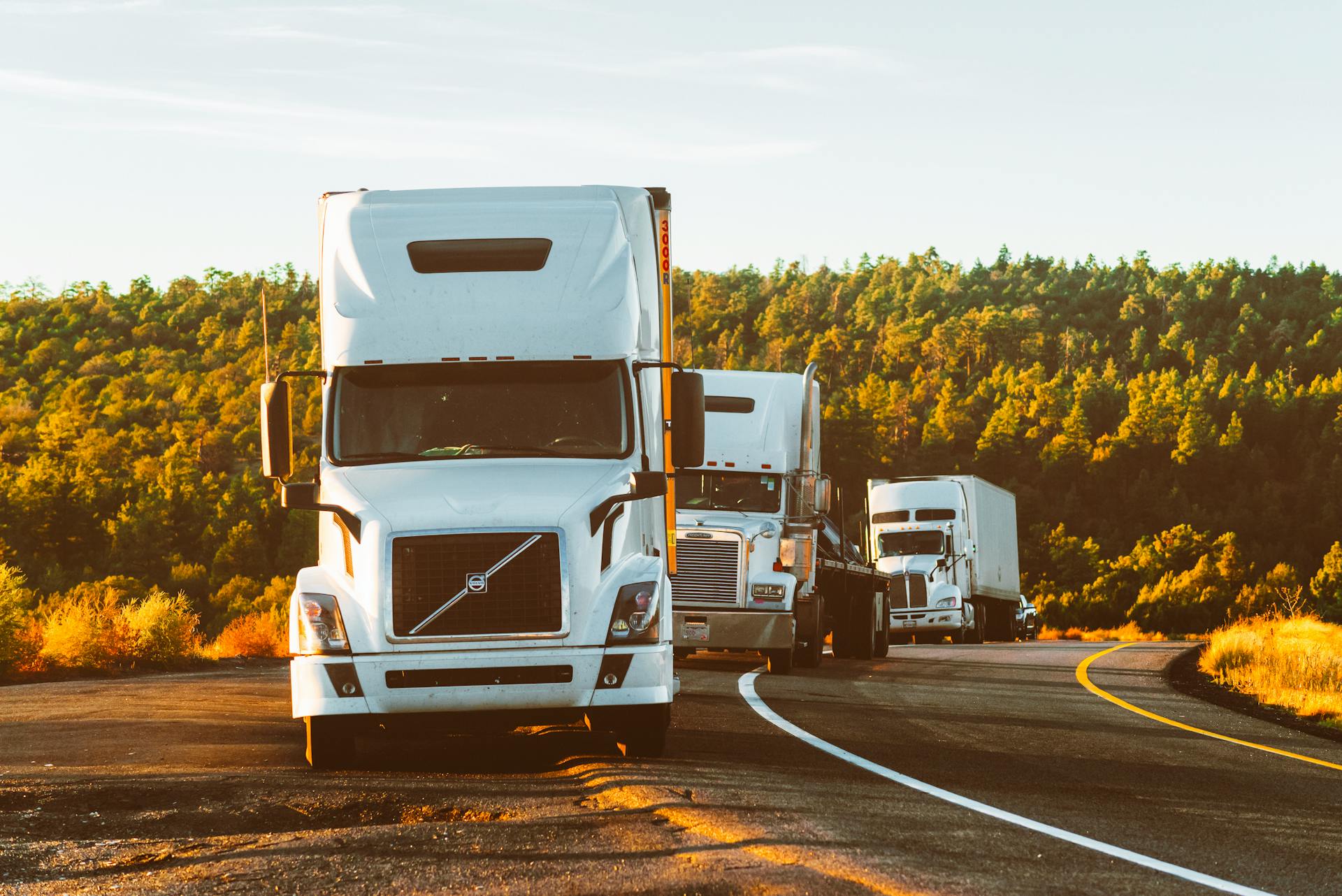 TAGNAL LOGISTICS LLC tractor and trailer ready to depart